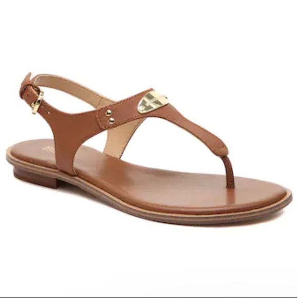 MICHAEL Michael Kors Shoes - Like New Michael KORS genuine leather thong flat sandals with logo plate.